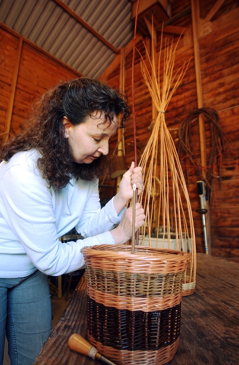 Member of South West Baker MAkers making a willow basketBasket Maker